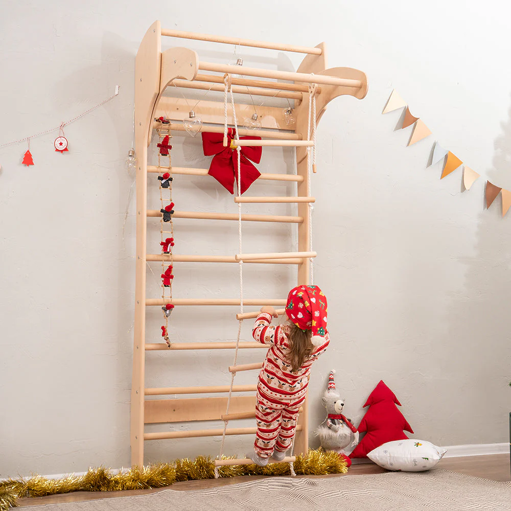 baby girl playing with swedish ladder